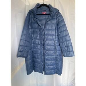 Woman within puffy packable coat